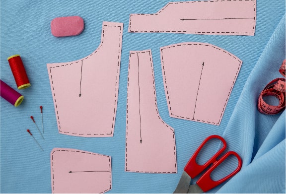 Sewing pattern on a blue table