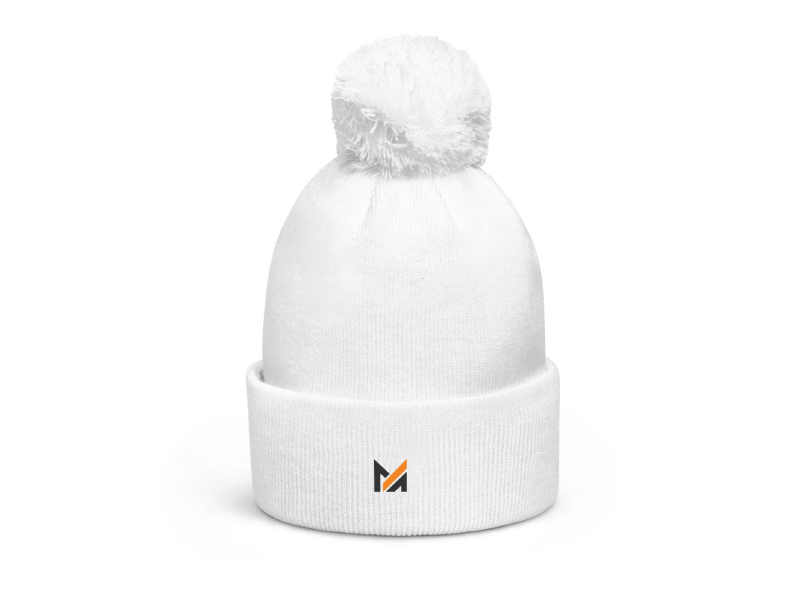A white Custom beanie with a pom pom and a Mega Apparel logo on it