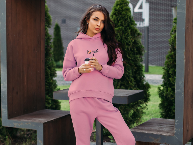 A woman wearing custom light blue leggings and white sneakers